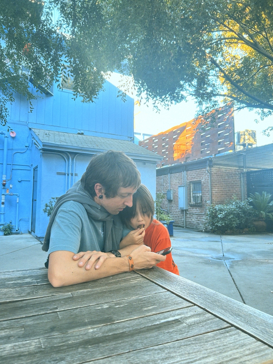 Geoff Nelson outdoors at a picnic table